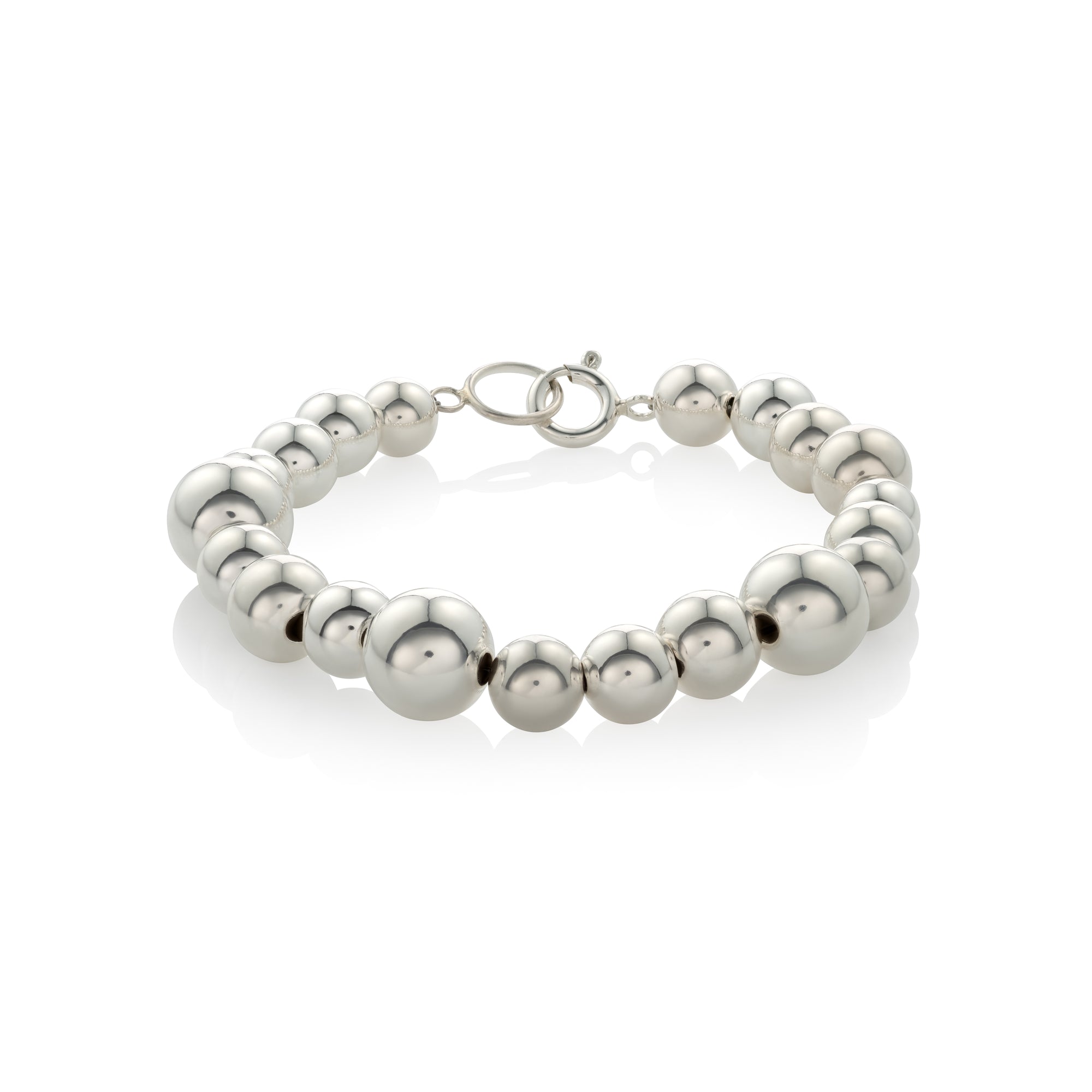 Statement bracelet crafted from fine sterling silver beads in varying sizes. 