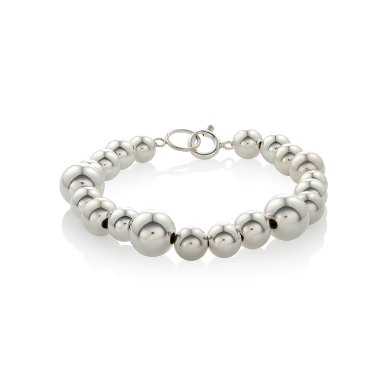 Statement bracelet crafted from fine sterling silver beads in varying sizes. 
