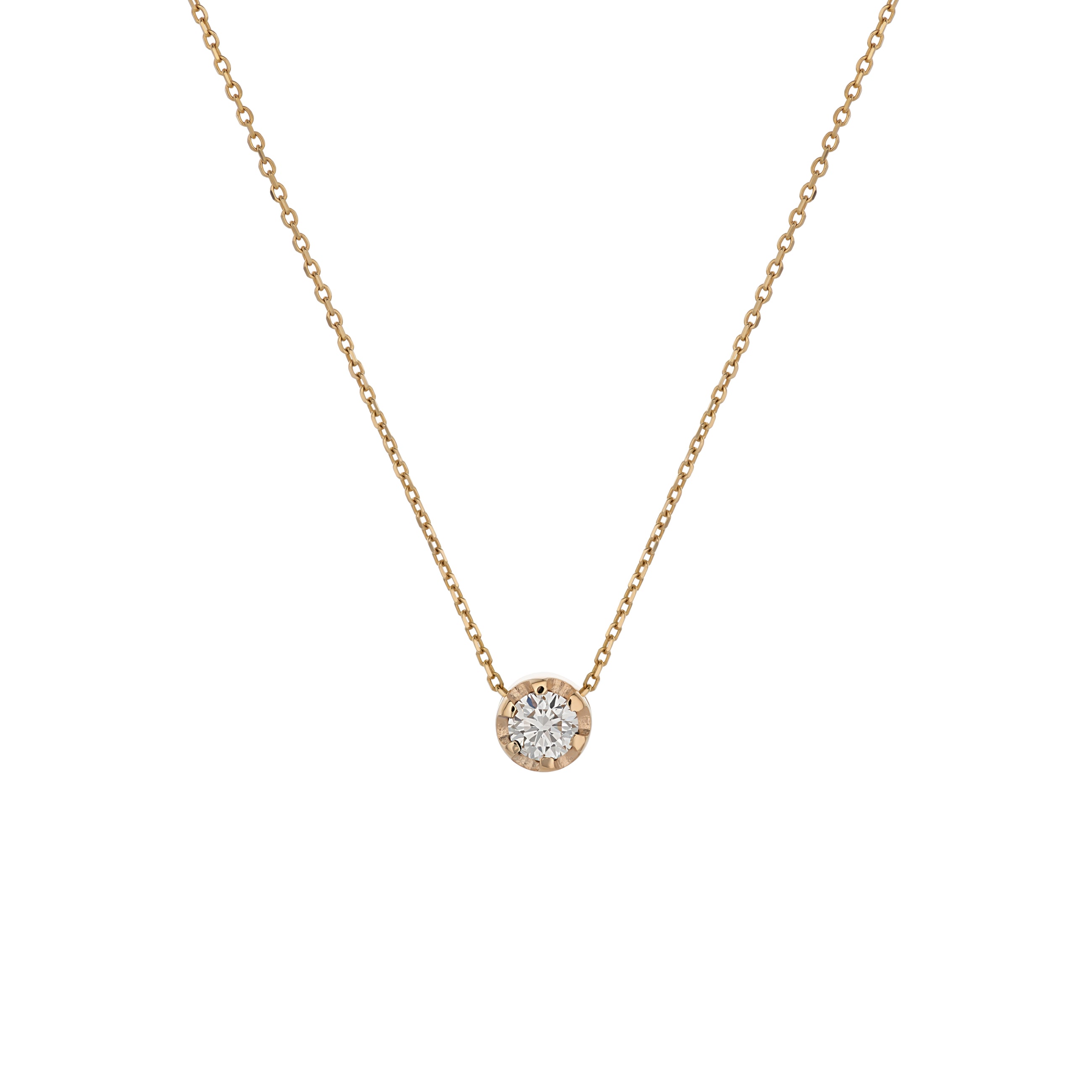 Yellow gold pendant featuring a round brilliant-cut diamond, suspended from a delicate gold chain. 