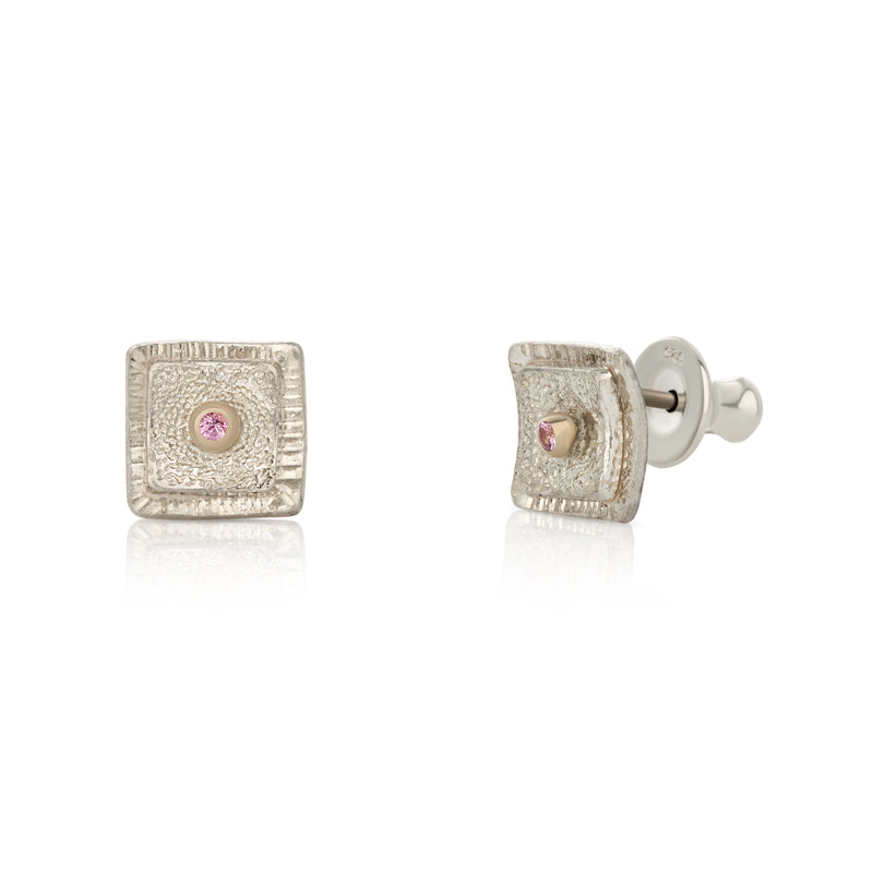 A pair of silver earrings with pink sapphires, designed by Ramunas Bil, from the Candy collection.