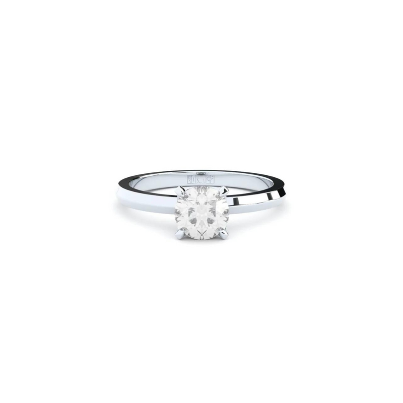 Exclusive engagement ring handcrafted in solid white gold. Set with the finest quality 1.30 ct laboratory-made diamond.