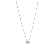 White gold pendant featuring a round brilliant-cut diamond, suspended from a delicate gold chain.